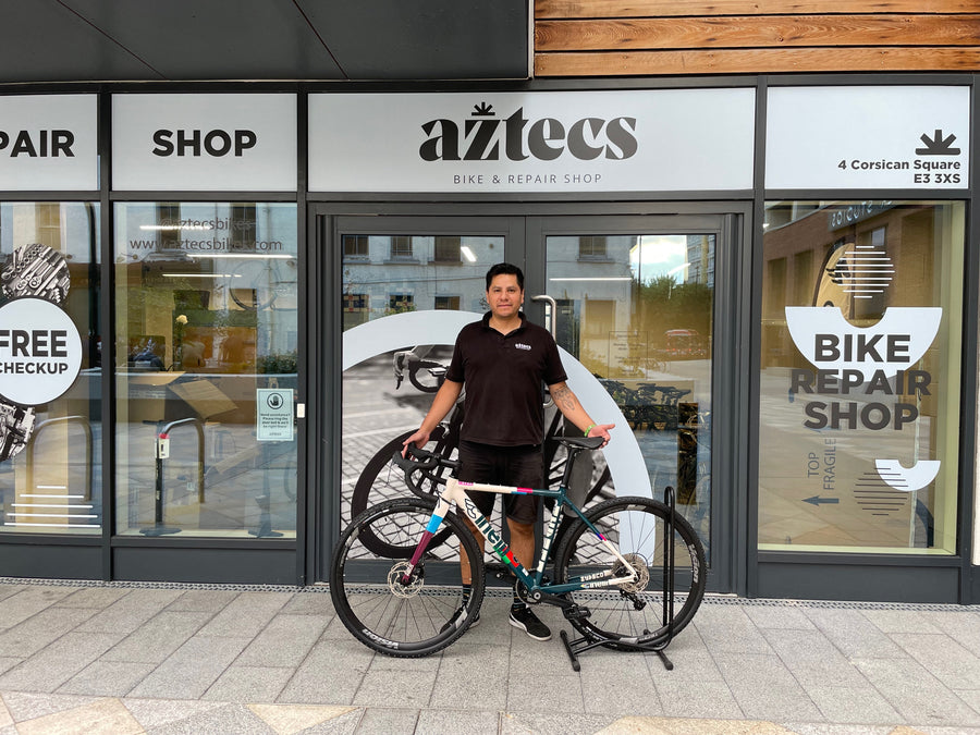 Marco outside the Aztecs Bikes shop at 4 Corsican Square in Bow