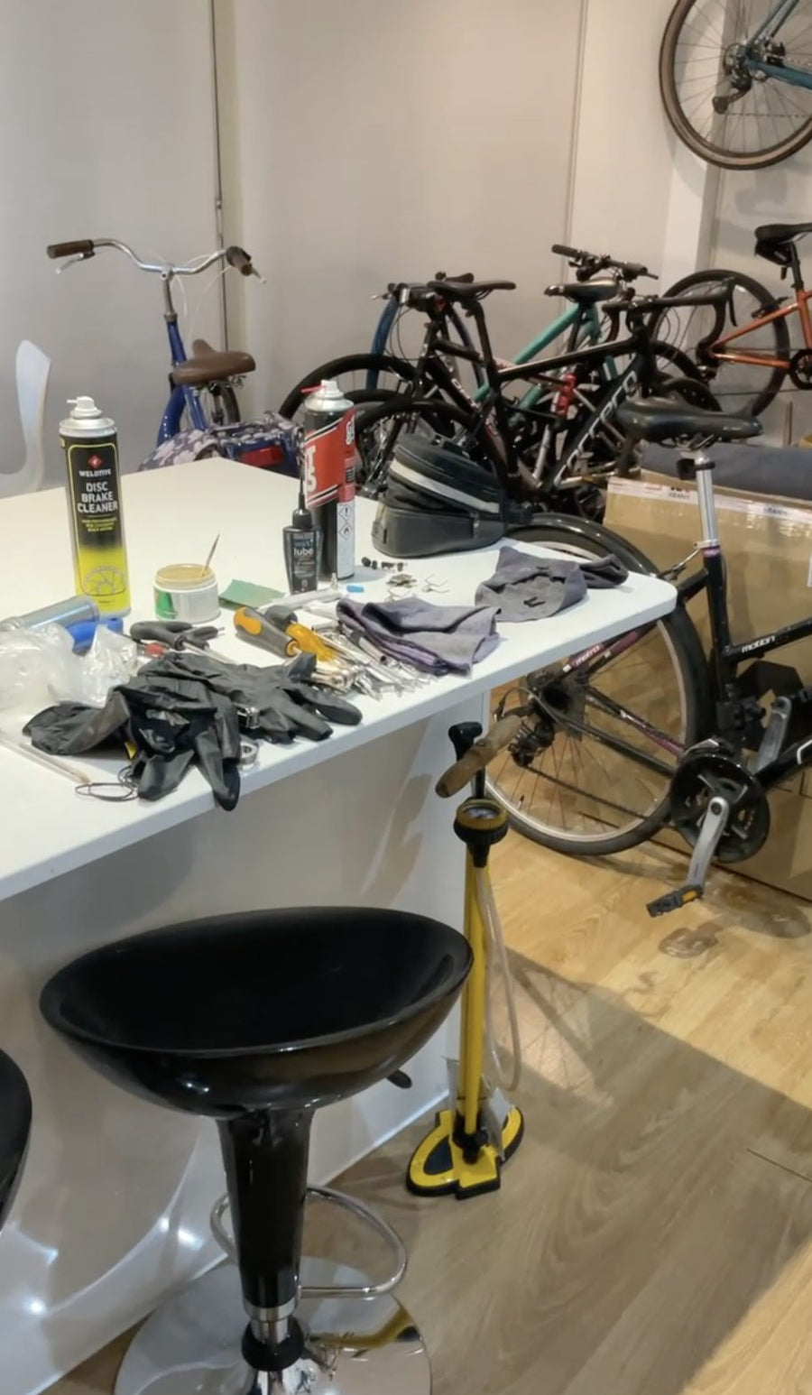 Bikes and repair tools filling the living room where Aztecs Bikes started in Bow