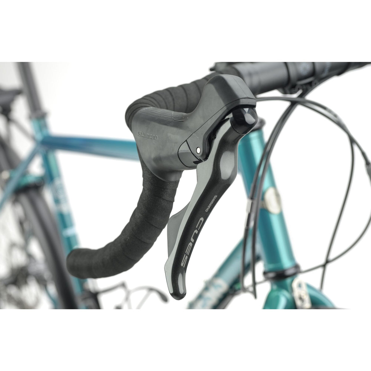 Shimano CUES STI lever on the drop bar of the Genesis Tour de Fer 20