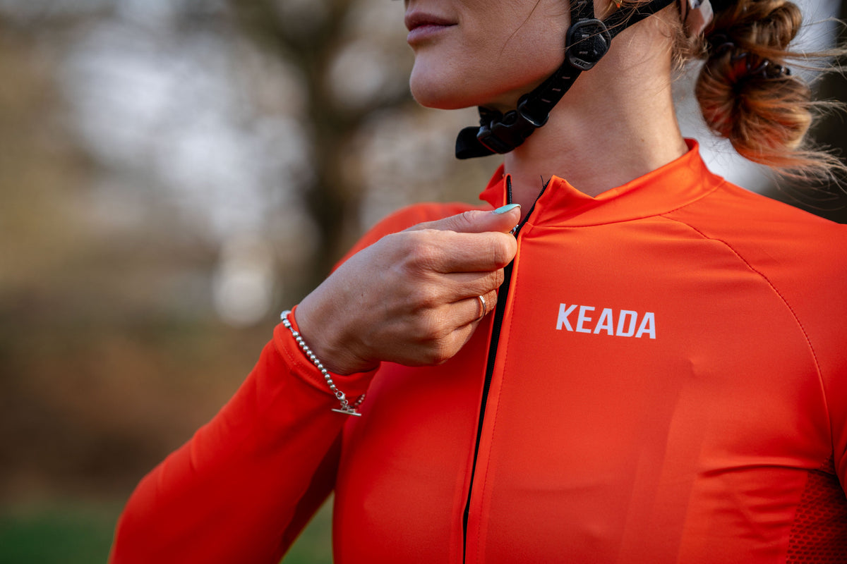 Keada Women's Essential Long Sleeved Cycling Jersey - Orange, alternative view 2, available at Aztecs Bikes in East London
